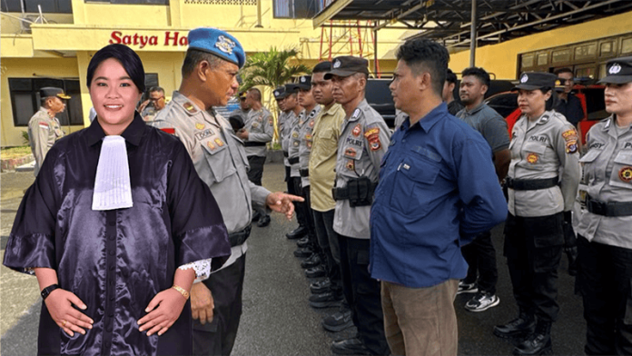 mutiara Mutiara Prischila Manafe dengan latar belakang Kasi Propam Polres Kupang Kota, Ipda. Frumentius Donatus Jawa Sadipun, SH sedang memeriksa kelengkapan anggotanya.